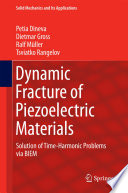 Dynamic Fracture of Piezoelectric Materials : Solution of Time-Harmonic Problems via BIEM
